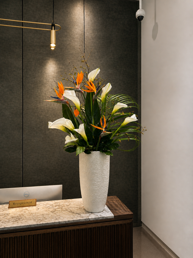 Elegant vase flower display in London office reception