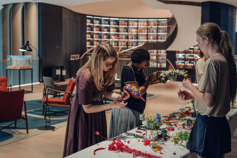People working on a craft project in flower workshops hosted in London
