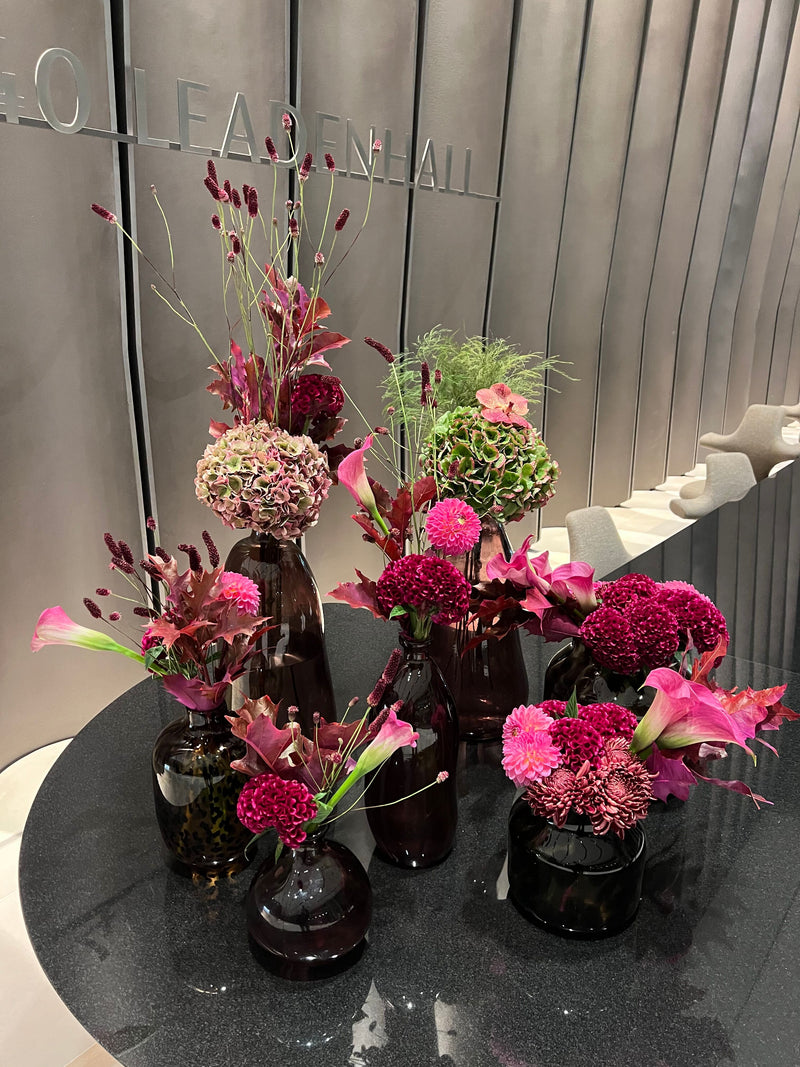 Large pink cluster flower arrangement in London office reception
