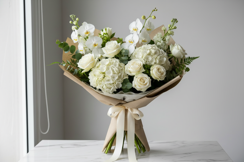 Luxury Unbreakable bouquet with white roses, orchids and hydrangeas